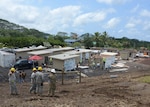 Engineers from the 230th Vertical Engineer Company, Hawaii National Guard, construct 20 micro shelters in Pahoa, Hawaii, June 9, 2018. The project is  a community effort led by Hope Services Hawaii, a faith-based non-profit organization.