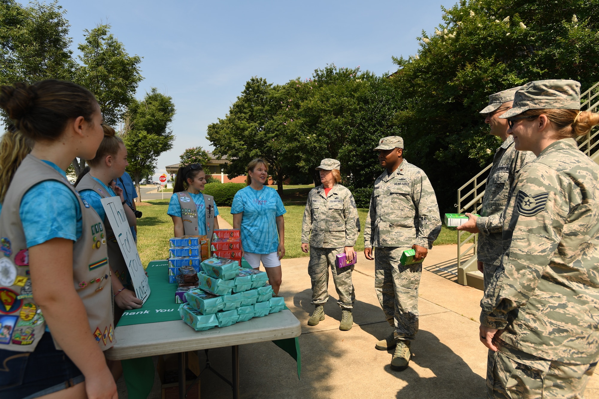 U.S. Air Force Airmen stopped by to pick out their favorite box of Girl Scout cookies from Troop 20436 of Denver, N.C., during the fifth annual visit to the North Carolina Air National Guard Base, Charlotte Douglas International Airport, June 9, 2018. Seven Girl Scouts showed appreciation for the military members as they handed out 600 boxes of cookies to Airmen.