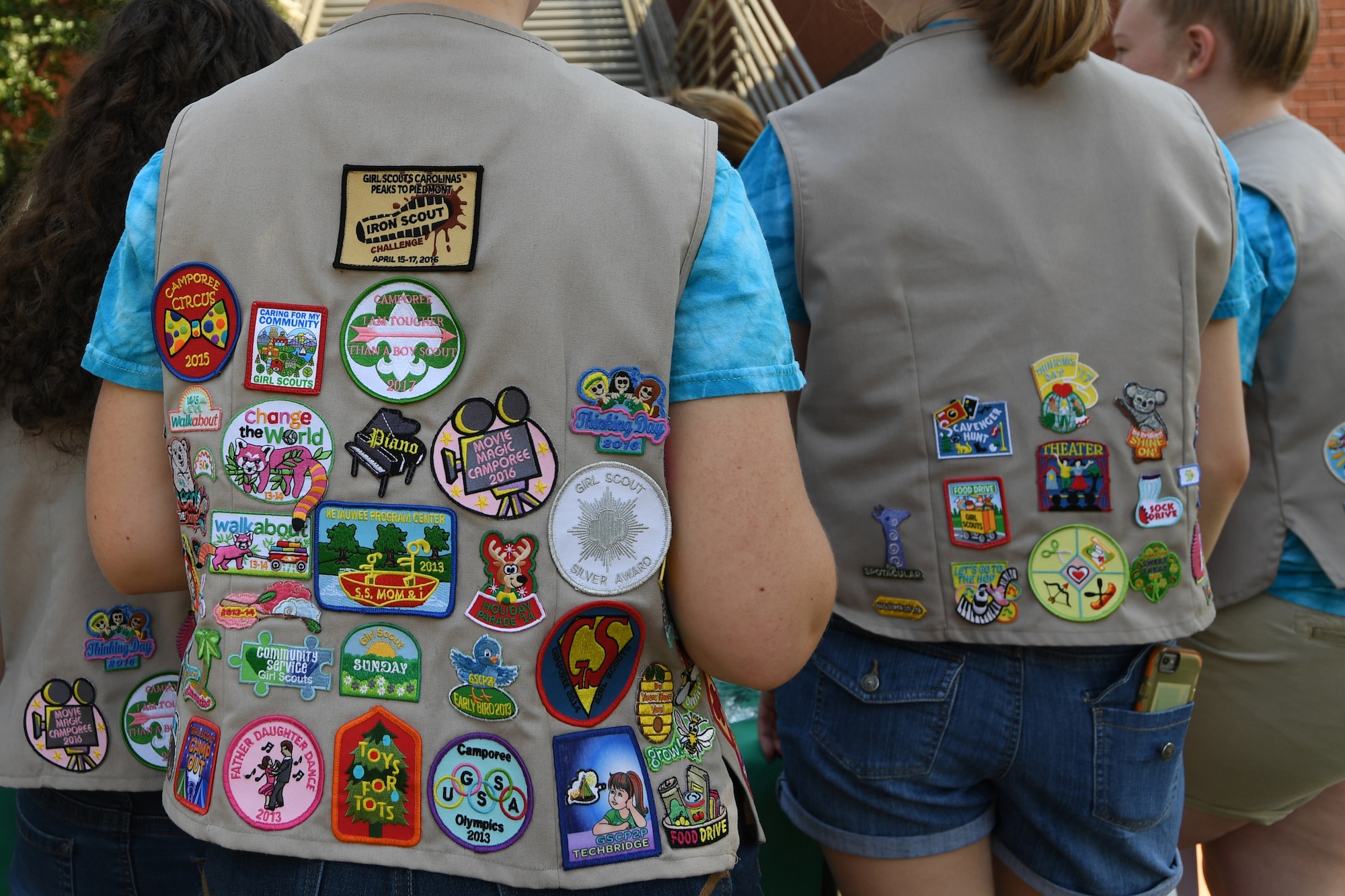 Girl Scouts from Troop 20436 of Denver, N.C., will earn a “Service to Others” patch for volunteering to hand out cookies at the North Carolina Air National Guard Base, Charlotte Douglas International Airport, June 9, 2018. Seven Girl Scouts showed appreciation for the military members as they handed out 600 boxes of cookies to Airmen during their fifth annual visit at the base.