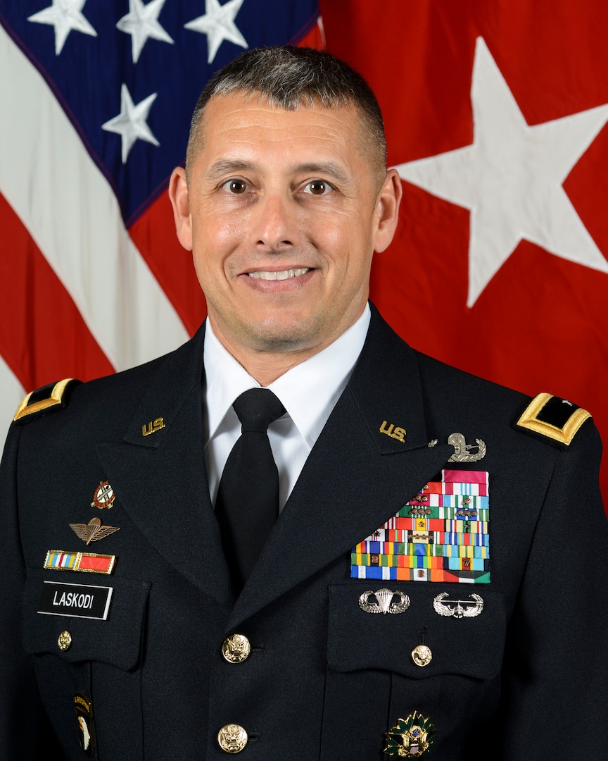 Outgoing Distribution commanding general recognized for expanding network, humanitarian efforts