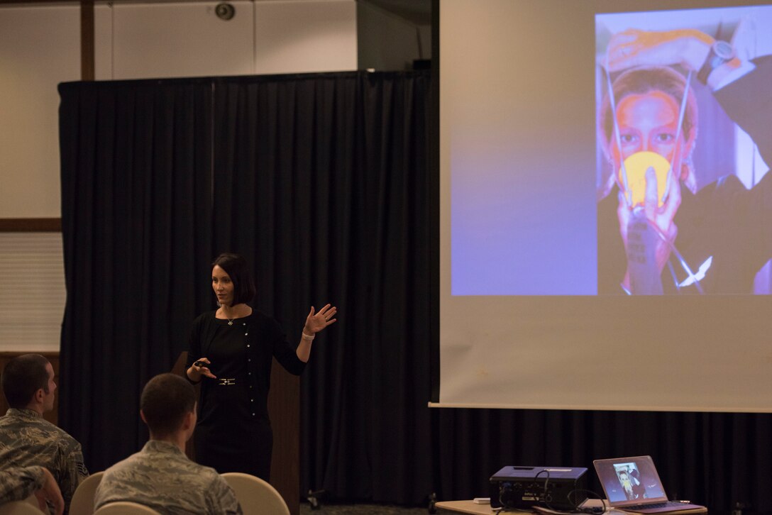 Retired U.S. Air Force Lt. Col. Jannell MacAulay, leadership and performance specialist consultant, speaks to Airmen at Ramstein Air Base, Germany, June 4, 2018. MacAulay spoke on mindfulness training and how it can protect service members’ brains in high-stress situations. (U.S. Air Force photo by Senior Airman Devin M. Rumbaugh)