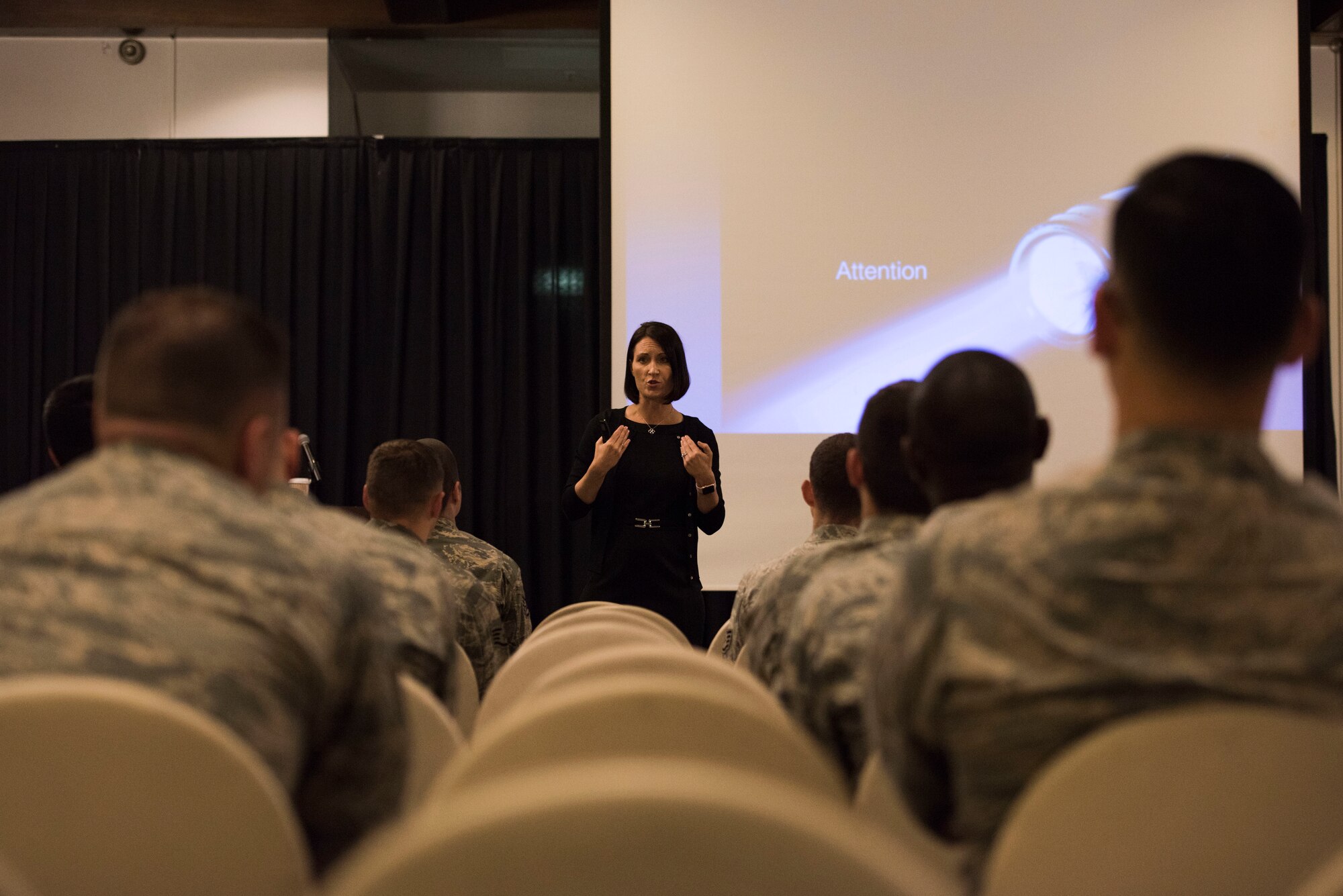 Retired U.S. Air Force Lt. Col. Jannell MacAulay, leadership and performance specialist consultant, speaks to Airmen at Ramstein Air Base, Germany, June 4, 2018. MacAulay is leading the charge to have mindfulness training implemented into U.S. Air Force policy, in order to improve performance of service members in high stress situations. (U.S. Air Force photo by Senior Airman Devin M. Rumbaugh)