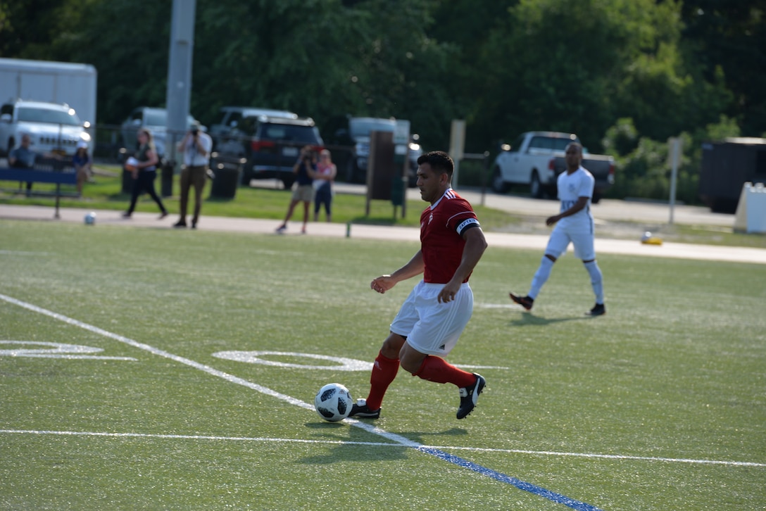 FORT BRAGG, N.C. (June 3, 2018) Gunnery Sgt. Alberto Boy of Camp Pendleton, Calif. competes for the first time at the Armed Forces Men’s Soccer Championship. The 2018 championship is held at Fort Bragg, N.C. from 2-10 June, and features service members from the Army, Marine Corps, Navy and Air Force. (U.S. Navy Photo by Lt. Dana Ayers/Released)