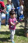 During the event there were activities for the whole family, food and an opportunity to create a human ribbon to recognize the Purple Ribbon Campaign, supporting Domestic Violence Awareness month. (Official USMC Photos by Sgt. Ryan M. Heintzelman)