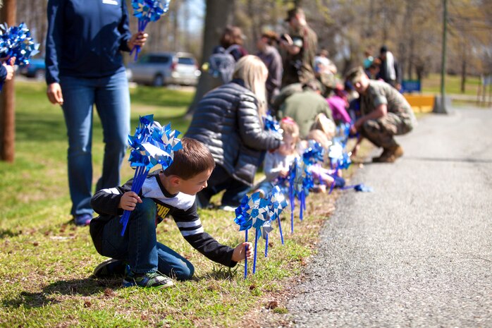 During the event there were activities for the whole family, food and an opportunity to create a human ribbon to recognize the Purple Ribbon Campaign, supporting Domestic Violence Awareness month. (Official USMC Photos by Sgt. Ryan M. Heintzelman)