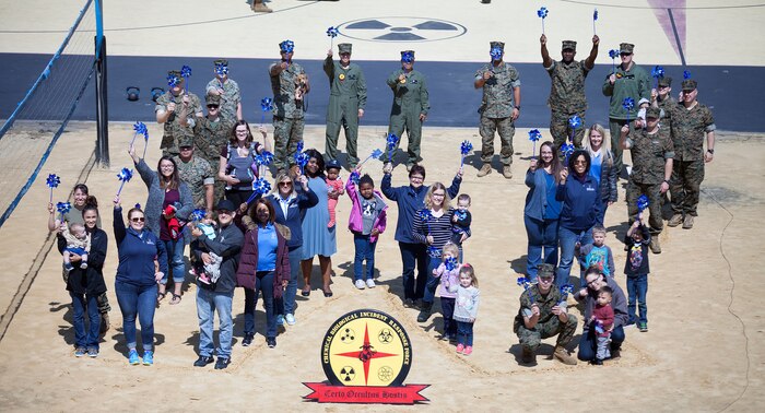 During the event there were activities for the whole family, food and an opportunity to create a human ribbon to recognize the Purple Ribbon Campaign, supporting Domestic Violence Awareness month. (Official USMC Photos by Sgt. Ryan M. Heintzelman)