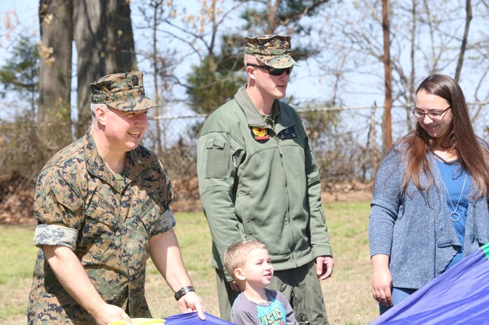 Chemical Biological Incident Response Force family readiness team, with the assistance of Marine Corps Community Services Henderson Hall, hosted a “Healthy Relationships” family day event aboard Naval Support Facility Indian Head, Md., April 17, 2018. During the event there were activities for the whole family, food and an opportunity to create a human ribbon to recognize the Purple Ribbon Campaign, supporting Domestic Violence Awareness month. (Official USMC Photos by Staff Sgt. Santiago G. Colon Jr.)