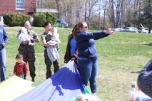 Chemical Biological Incident Response Force family readiness team, with the assistance of Marine Corps Community Services Henderson Hall, hosted a “Healthy Relationships” family day event aboard Naval Support Facility Indian Head, Md., April 17, 2018. During the event there were activities for the whole family, food and an opportunity to create a human ribbon to recognize the Purple Ribbon Campaign, supporting Domestic Violence Awareness month. (Official USMC Photos by Staff Sgt. Santiago G. Colon Jr.)