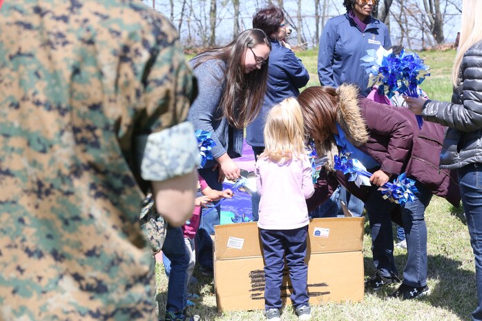 Chemical Biological Incident Response Force family readiness team, with the assistance of Marine Corps Community Services Henderson Hall, hosted a “Healthy Relationships” family day event aboard Naval Support Facility Indian Head, Md., April 17, 2018. During the event there were activities for the whole family, food and an opportunity to create a human ribbon to recognize the Purple Ribbon Campaign, supporting Domestic Violence Awareness month. (Official USMC Photos by Staff Sgt. Santiago G. Colon Jr.)