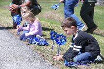 Chemical Biological Incident Response Force family readiness team, with the assistance of Marine Corps Community Services Henderson Hall, hosted a “Healthy Relationships” family day event aboard Naval Support Facility Indian Head, Md., April 17, 2018. During the event there were activities for the whole family, food and an opportunity to create a human ribbon to recognize the Purple Ribbon Campaign, supporting Domestic Violence Awareness month. (Official USMC Photos by Staff Sgt. Santiago G. Colon Jr.)
