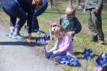 Chemical Biological Incident Response Force family readiness team, with the assistance of Marine Corps Community Services Henderson Hall, hosted a “Healthy Relationships” family day event aboard Naval Support Facility Indian Head, Md., April 17, 2018. During the event there were activities for the whole family, food and an opportunity to create a human ribbon to recognize the Purple Ribbon Campaign, supporting Domestic Violence Awareness month. (Official USMC Photos by Staff Sgt. Santiago G. Colon Jr.)