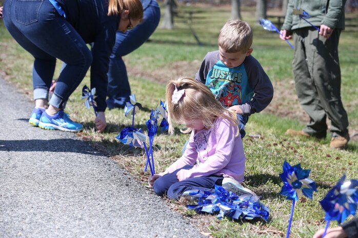 Chemical Biological Incident Response Force family readiness team, with the assistance of Marine Corps Community Services Henderson Hall, hosted a “Healthy Relationships” family day event aboard Naval Support Facility Indian Head, Md., April 17, 2018. During the event there were activities for the whole family, food and an opportunity to create a human ribbon to recognize the Purple Ribbon Campaign, supporting Domestic Violence Awareness month. (Official USMC Photos by Staff Sgt. Santiago G. Colon Jr.)