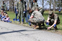 Chemical Biological Incident Response Force family readiness team, with the assistance of Marine Corps Community Services Henderson Hall, hosted a “Healthy Relationships” family day event aboard Naval Support Facility Indian Head, Md., April 17, 2018. During the event there were activities for the whole family, food and an opportunity to create a human ribbon to recognize the Purple Ribbon Campaign, supporting Domestic Violence Awareness month. (Official USMC Photos by Staff Sgt. Santiago G. Colon Jr.)