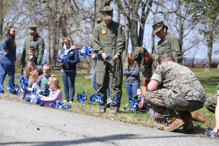 Chemical Biological Incident Response Force family readiness team, with the assistance of Marine Corps Community Services Henderson Hall, hosted a “Healthy Relationships” family day event aboard Naval Support Facility Indian Head, Md., April 17, 2018. During the event there were activities for the whole family, food and an opportunity to create a human ribbon to recognize the Purple Ribbon Campaign, supporting Domestic Violence Awareness month. (Official USMC Photos by Staff Sgt. Santiago G. Colon Jr.)
