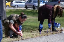 Chemical Biological Incident Response Force family readiness team, with the assistance of Marine Corps Community Services Henderson Hall, hosted a “Healthy Relationships” family day event aboard Naval Support Facility Indian Head, Md., April 17, 2018. During the event there were activities for the whole family, food and an opportunity to create a human ribbon to recognize the Purple Ribbon Campaign, supporting Domestic Violence Awareness month. (Official USMC Photos by Staff Sgt. Santiago G. Colon Jr.)