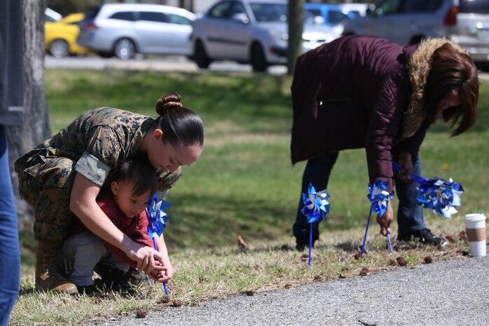 Chemical Biological Incident Response Force family readiness team, with the assistance of Marine Corps Community Services Henderson Hall, hosted a “Healthy Relationships” family day event aboard Naval Support Facility Indian Head, Md., April 17, 2018. During the event there were activities for the whole family, food and an opportunity to create a human ribbon to recognize the Purple Ribbon Campaign, supporting Domestic Violence Awareness month. (Official USMC Photos by Staff Sgt. Santiago G. Colon Jr.)