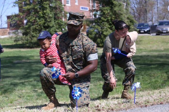 Chemical Biological Incident Response Force family readiness team, with the assistance of Marine Corps Community Services Henderson Hall, hosted a “Healthy Relationships” family day event aboard Naval Support Facility Indian Head, Md., April 17, 2018. During the event there were activities for the whole family, food and an opportunity to create a human ribbon to recognize the Purple Ribbon Campaign, supporting Domestic Violence Awareness month. (Official USMC Photos by Staff Sgt. Santiago G. Colon Jr.)