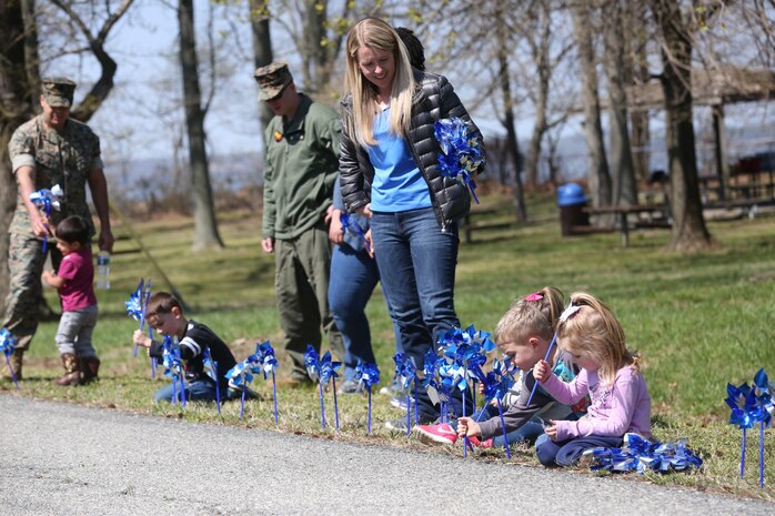 Chemical Biological Incident Response Force family readiness team, with the assistance of Marine Corps Community Services Henderson Hall, hosted a “Healthy Relationships” family day event aboard Naval Support Facility Indian Head, Md., April 17, 2018. During the event there were activities for the whole family, food and an opportunity to create a human ribbon to recognize the Purple Ribbon Campaign, supporting Domestic Violence Awareness month. (Official USMC Photos by Staff Sgt. Santiago G. Colon Jr.)