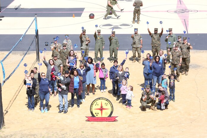 Chemical Biological Incident Response Force family readiness team, with the assistance of Marine Corps Community Services Henderson Hall, hosted a “Healthy Relationships” family day event aboard Naval Support Facility Indian Head, Md., April 17, 2018. During the event there were activities for the whole family, food and an opportunity to create a human ribbon to recognize the Purple Ribbon Campaign, supporting Domestic Violence Awareness month. (Official USMC Photos by Staff Sgt. Santiago G. Colon Jr.)