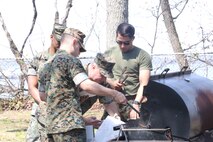 Chemical Biological Incident Response Force family readiness team, with the assistance of Marine Corps Community Services Henderson Hall, hosted a “Healthy Relationships” family day event aboard Naval Support Facility Indian Head, Md., April 17, 2018. During the event there were activities for the whole family, food and an opportunity to create a human ribbon to recognize the Purple Ribbon Campaign, supporting Domestic Violence Awareness month. (Official USMC Photos by Staff Sgt. Santiago G. Colon Jr.)