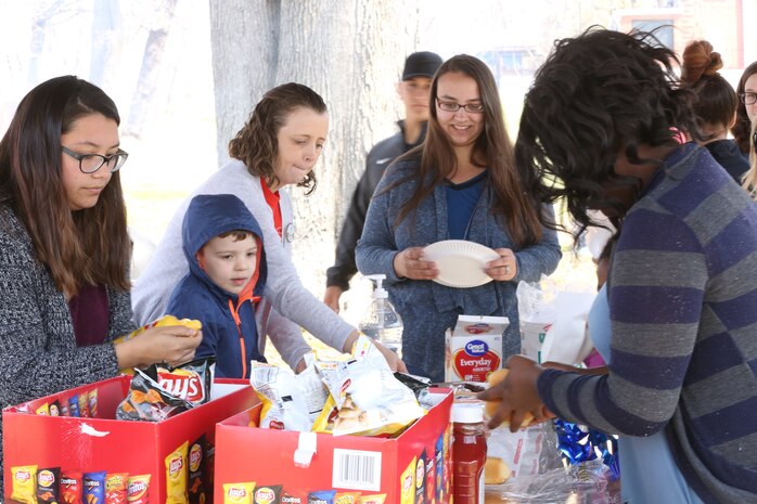 Chemical Biological Incident Response Force family readiness team, with the assistance of Marine Corps Community Services Henderson Hall, hosted a “Healthy Relationships” family day event aboard Naval Support Facility Indian Head, Md., April 17, 2018. During the event there were activities for the whole family, food and an opportunity to create a human ribbon to recognize the Purple Ribbon Campaign, supporting Domestic Violence Awareness month. (Official USMC Photos by Staff Sgt. Santiago G. Colon Jr.)