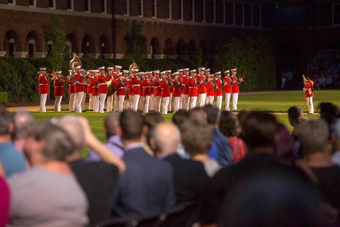 Marines with “The President’s Own” U.S. Marine Band performs a musical ballad during the Friday Evening Parade at Marine Barracks Washington D.C., June 8, 2018. The hosting official for the parade was U.S. Marine Corps Lt. Gen. Frank McKenzie, director, Joint Staff, and the guests of honor were U.S. Army Lt. Gen. Joseph Anderson, deputy chief of staff for the Army; U.S. Marine Corps Lt. Gen. Brian Beaudreault, deputy commandant, plans, policies and operation; U.S. Navy Vice Adm. Andrew Lewis, deputy chief of operations for operations, plans and strategy; and U.S. Air Force Lt. Gen. Mark C. Nowland, deputy chief of staff for operations. (Official Marine Corps photo by Sgt. Robert Knapp/Released)