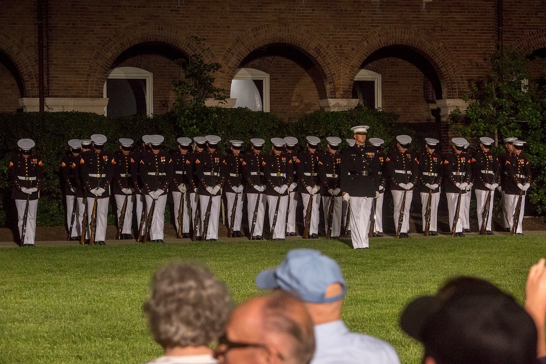 Marines with 3rd platoon, Bravo Company, Marine Barracks Washington D.C., execute “fix bayonets” during the Friday Evening Parade at the Marine Barracks Washington D.C., June 8, 2018.