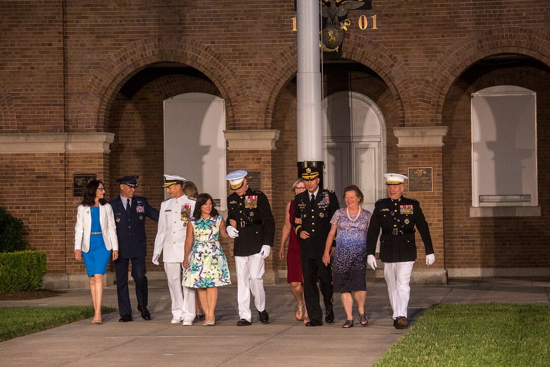 The official party walks down Center Walk at the start of the Evening Parade at Marine Barracks Washington D.C., June 8, 2018.