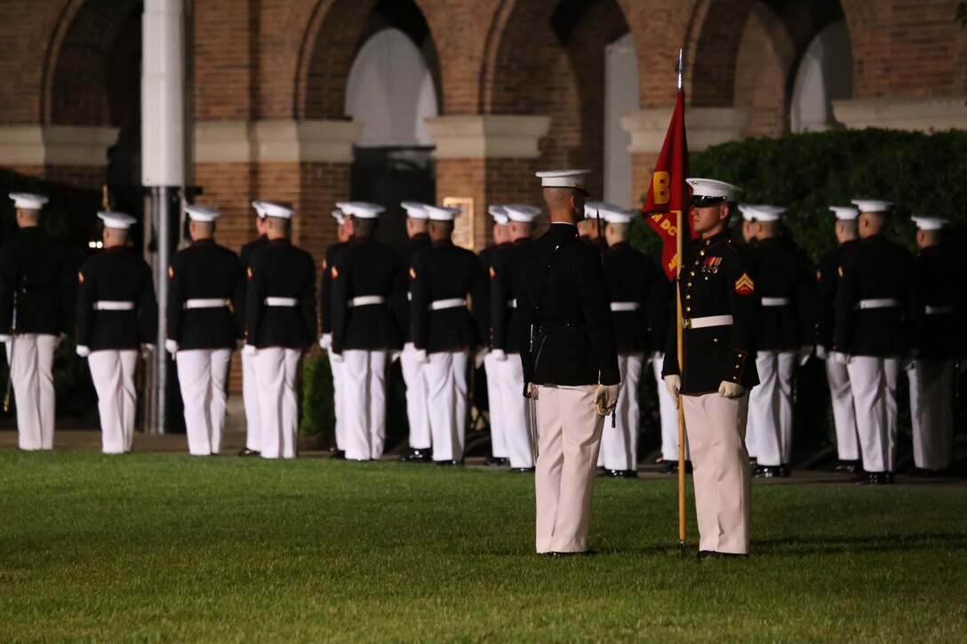 Marines with Bravo Company, Marine Barracks Washington D.C., perform during the Friday Evening Parade at the Barracks, June 8, 2018. The hosting official for the parade was U.S. Marine Corps Lt. Gen. Frank McKenzie, director, Joint Staff, and the guests of honor were U.S. Army Lt. Gen. Joseph Anderson, deputy chief of staff for the Army; U.S. Marine Corps Lt. Gen. Brian Beaudreault, deputy commandant, plans, policies and operation; U.S. Navy Vice Adm. Andrew Lewis, deputy chief of operations for operations, plans and strategy; and U.S. Air Force Lt. Gen. Mark C. Nowland, deputy chief of staff for operations.