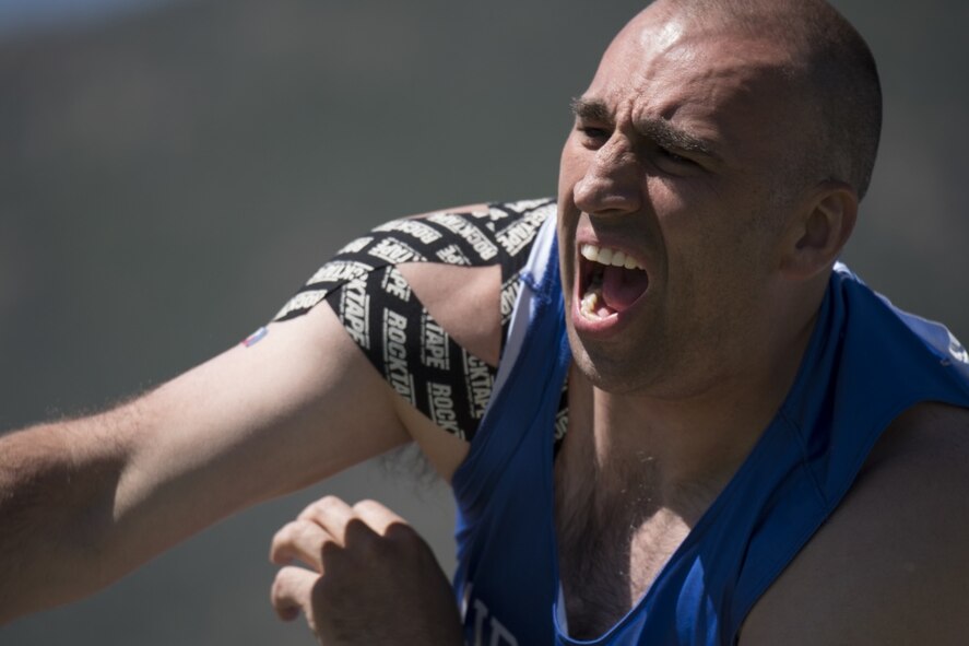Master Sgt. Michael Christiansen, Department of Defense Warrior Games athlete on Team Air Force, competes in the seated shot put event at the Games in Colorado Springs, Colo., June 2, 2018. Adaptive sports, like those practiced at the warrior Games, provide opportunities for athletes to heal and to regain confidence and purpose; the Games are a way to celebrate the athlete’s efforts and commitment to healing. (U.S. Air Force photo by Senior Airman Dennis Hoffman)