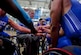 Team Air Force wheelchair basketball coach Mark Shepeherd gathers the team around before their game against Team Marine Corps during the Department of Defense Warrior Games at the U.S. Air Force Academy, Colorado Springs, Colo., June 3, 2018. Wheelchair basketball was developed by World War II U.S. veterans in 1945, and the sport was introduced on the global stage at the Rome 1960 Paralympic Games. Wheelchair basketball retains most major rules and scoring of basketball, but some rules have been modified with consideration for the wheelchair. (U.S. Air Force photo by Tech Sgt. Anthony Nelson Jr.)