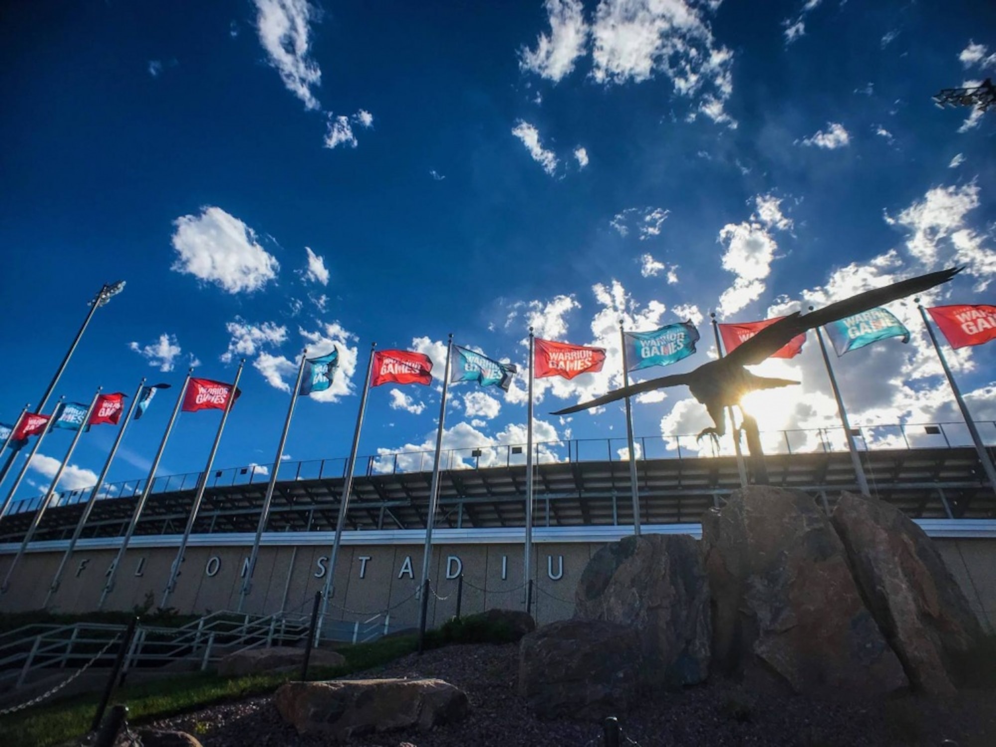 The sun sets over Falcon Stadium at the Air Force Academy in Colorado Springs, Colo., May 31, 2018. The Department of Defense Warrior Games were held at the Academy June 1-9. (U.S. Air Force photo by Senior Airman Treven Cannon)