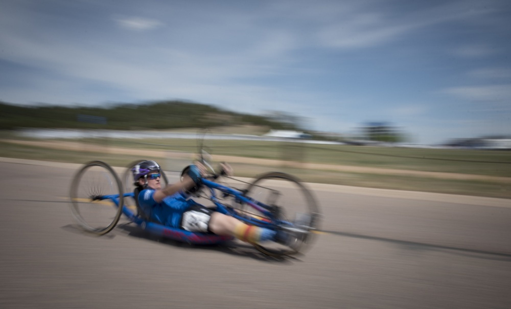 Master Sgt. Lisa Goad, Department of Defense Warrior Games athlete and Team Air Force member, competes in the cycling competition at the U.S. Air Force Academy, Colorado Springs, Colo., June 6, 2018. Competing in the Games are service members and veterans with upper-body and lower-body limitations, spinal cord injuries, traumatic brain injuries, visual impairments, serious illnesses, and post-traumatic stress. Each of the Air Force’s 39 participating athletes will compete in one or more of 11 sports including archery, cycling, shooting, sitting volleyball, swimming, track, field, wheelchair basketball, indoor rowing, powerlifting, and time-trial cycling. (U.S. Air Force photo by Senior Airman Dennis Hoffman)