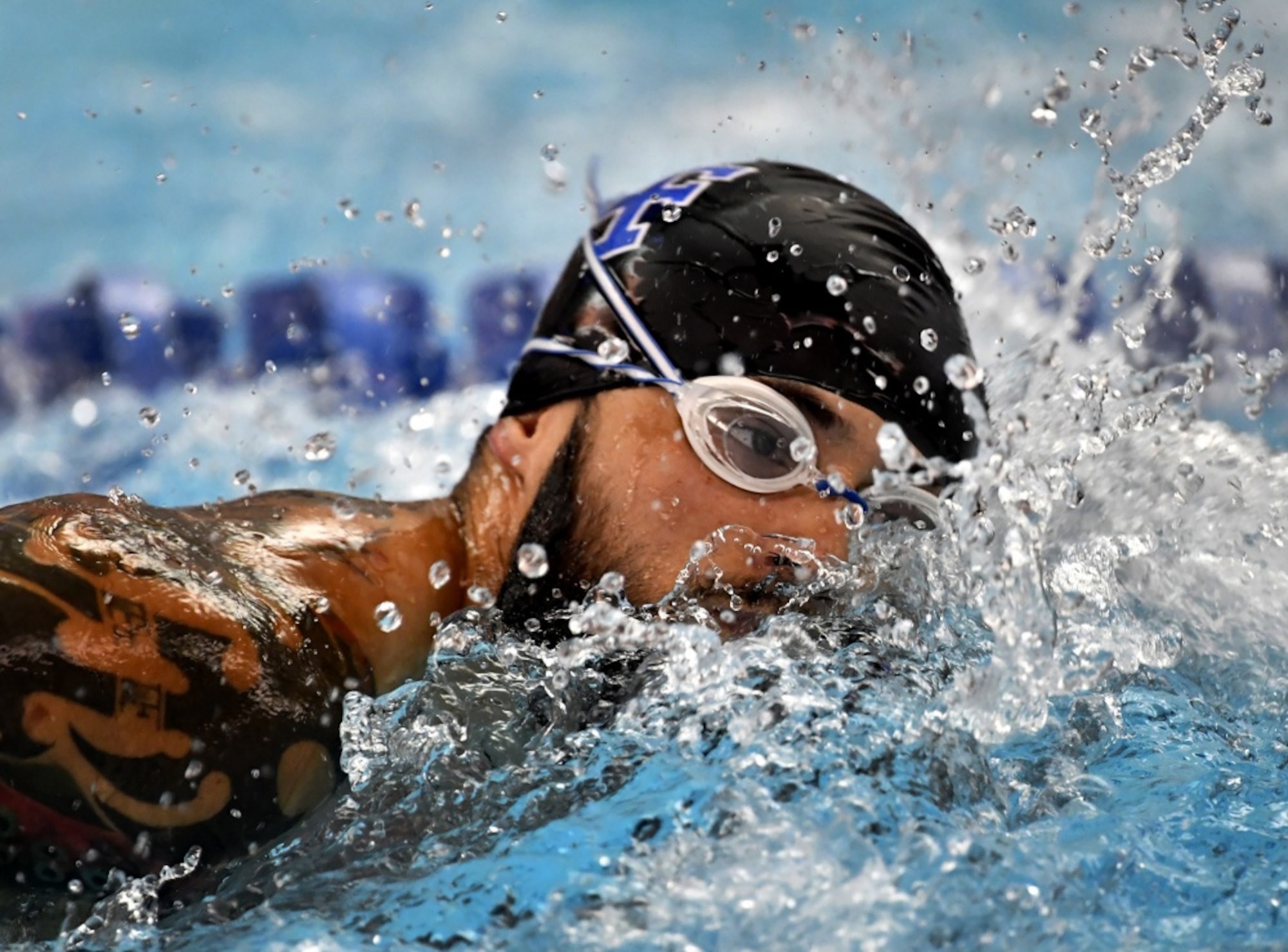 Team Air Force member Rafael Morfinenciso competes in the Department of Defense Warrior Games swimming competition at the U.S. Air Force Academy, Colorado Springs, Colo., June 7, 2018. There were 39 athletes representing Team Air Force at the Games, competing against wounded, ill and injured service members and veterans representing the U.S. Army, Marine Corps, Navy, and Special Operations Command, as well as athletes from the U.K. Armed Forces, Australian Defence Force and Canadian Armed Forces (U.S. Air Force photo by Staff Sgt. Rusty Frank)