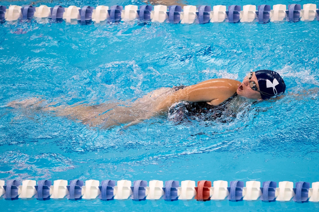 A sailor competes in the 50-yard freestyle swimming event.