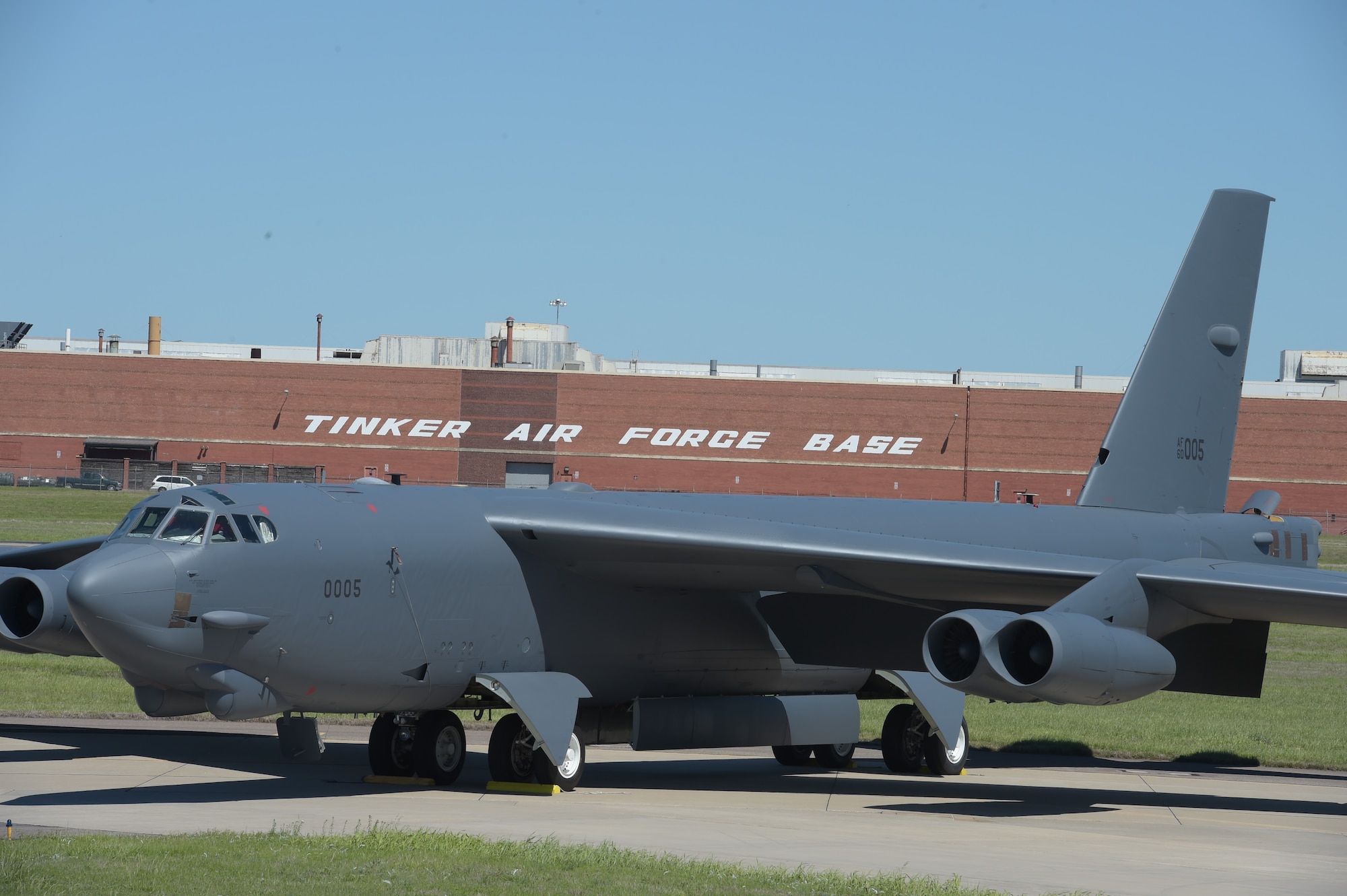 Boeing B-52H, 60-0005, parked in front of Oklahoma City Air Logistics Complex Bldg. 3001 following major overhaul on May 1, 2017, Tinker Air Force Base, Oklahoma. OC-ALC is responsible for depot level maintenance of the B-52 fleet with a large portion of the work taking place in the building shown behind. (U.S. Air Force photo/Greg L. Davis)