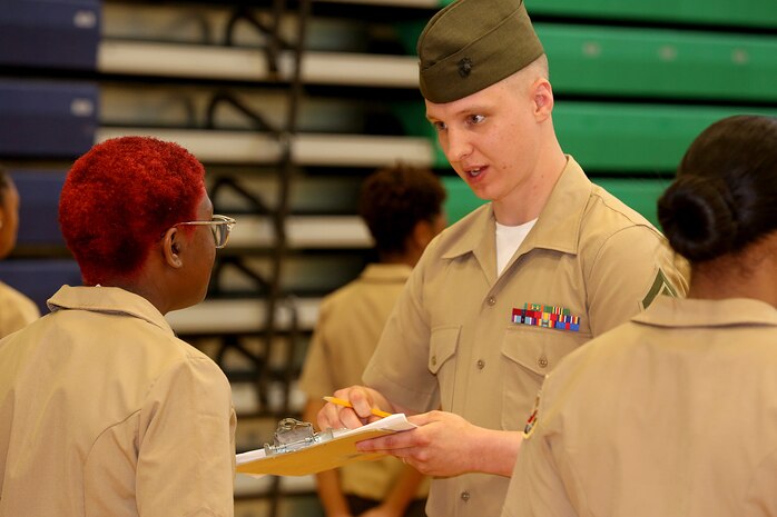 Marines and Sailors with Chemical Biological Incident Response Force, U.S. Marine Corps Forces Command, volunteered their time to conduct a JROTC uniform inspection at St. Charles High School in Waldorf, Md., April 18, 2018. During the inspection the Marines and sailors looked over the students’ uniforms, tested their military knowledge and shared their expertise with the high school students. (Official USMC Photos by Staff Sgt. Santiago G. Colon Jr.)