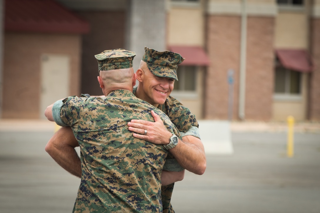 U.S. Marine Corps Lt. Col. William E. O’Brien, left, the outgoing commanding general of 3rd Assault Amphibian Battalion (AABN), 1st Marine Division, congratulates Lt. Col. Keith C. Brenize, the oncoming commanding general of 3rd AABN during a change of command ceremony at Marine Corps Base Camp Pendleton, Calif., June 1, 2018. The ceremony was held in honor of O’Brien, who relinquished his post as 3rd AABN commanding general to Brenize.