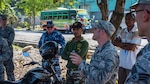 U.S. Air Force Master Sgt. Damon Weigl, the Pacific Angel 18-1 engineer team lead, explains what his team can expect in the next couple weeks during a site visit in Suai, Timor-Leste, June 7, 2018.