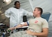 U.S. Air Force Senior Airman Matthew Langer, 86th Communications Squadron client systems technician, donates blood during the 86th Medical Group's exercise Maroon Surge Community Outreach Day on Ramstein Air Base, Germany, June 7, 2018. The 86th MDG designed Community Outreach Day to educate the public on their life-saving capabilities and also invite them to participate in saving a life by donating blood and bone marrow. (U.S. Air Force photo by Senior Airman Elizabeth Baker)