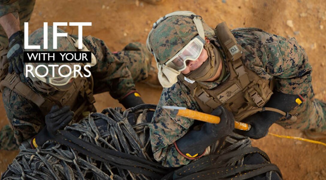 Landing support specialist Marines with Air Delivery Platoon, 3rd Transportation Support Battalion, 3rd Marine Logistics Group standby to secure a load of tires to an MV-22 Osprey during external lift training June 6, 2018 at Landing Zone Dodo, Camp Hansen, Okinawa, Japan. This training is designed to enhance the Marines’ techniques and procedures when securing cargo for external and internal lifts. (U.S. Marine Corps photo by Lance Cpl. Zackary M. Walker)