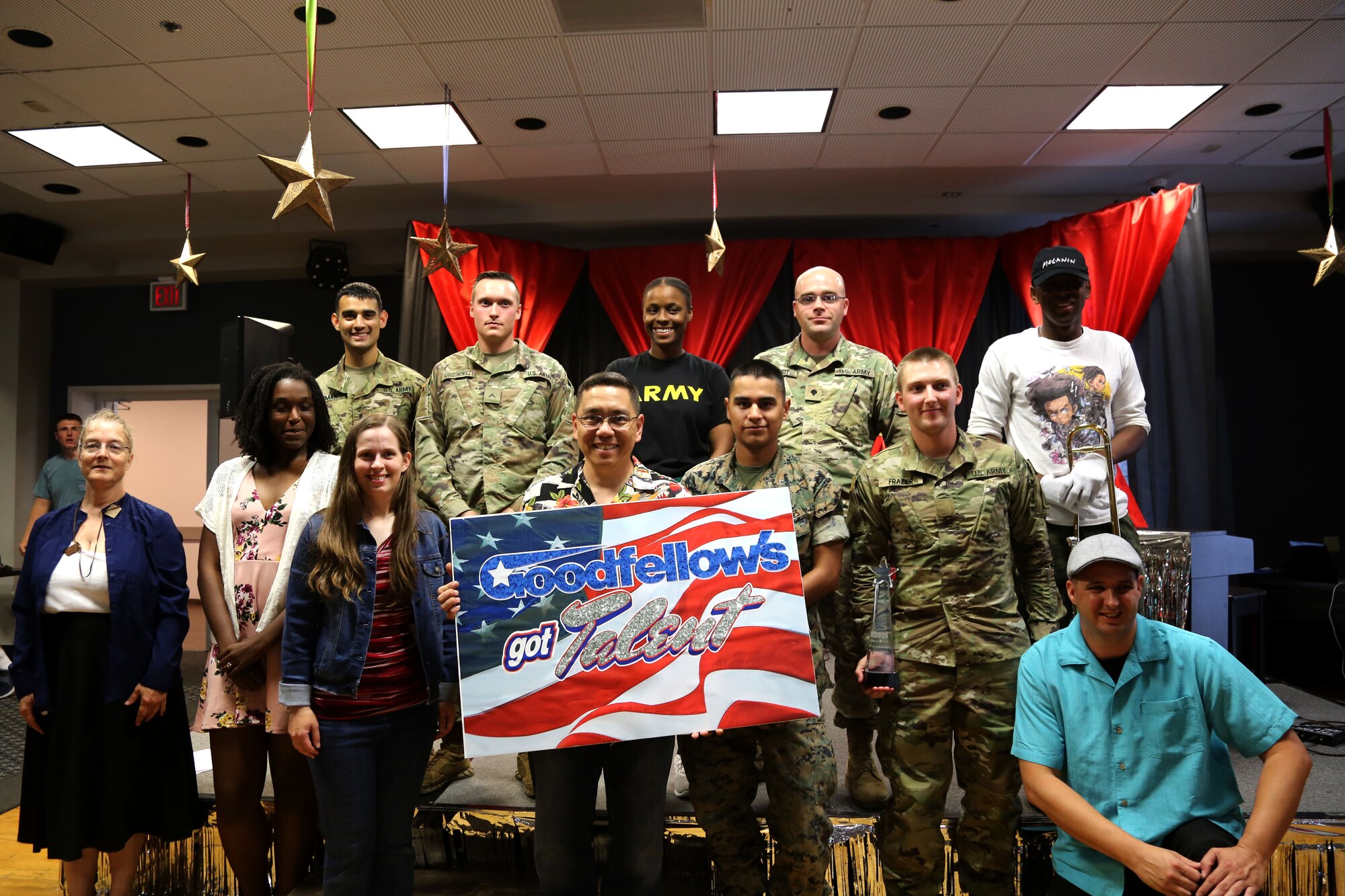 All the participants from Goodfellow’s Got Talent take a moment after the show to pose together at the Event Center on Goodfellow Air Force Base, Texas, June 8, 2018. Enlisted and officers from all of the branches of service at Goodfellow were able to take part in the talent show this year. (Courtesy photo)