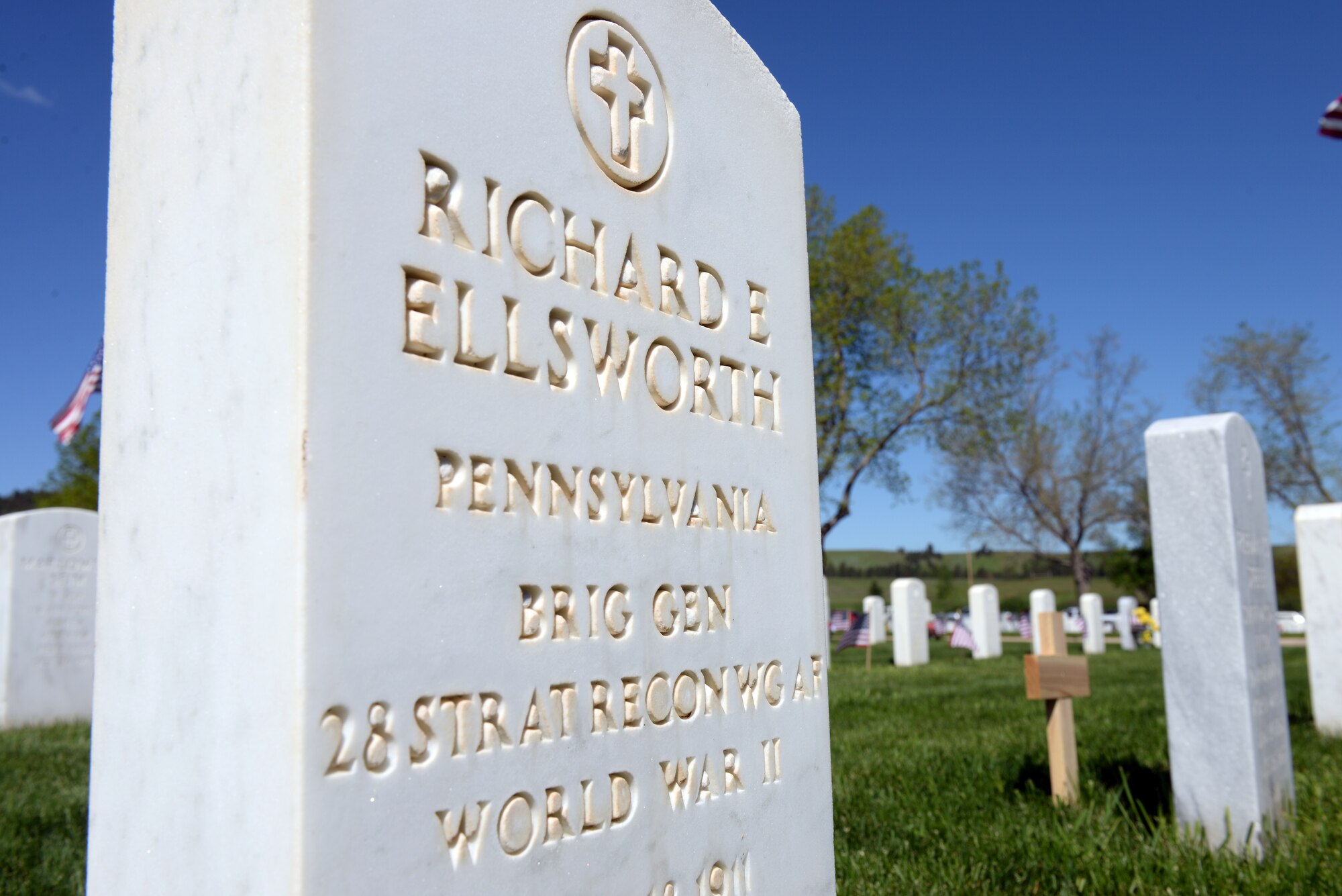 Brig. Gen. Richard Ellsworth’s gravestone stands decorated at the Black Hills National Cemetery, S.D., May 29, 2017. Ellsworth was the 28th Strategic Reconnaissance Wing commander before he was killed in a plane crash March 18, 1953. (U.S. Air Force photo by Airman Nicolas Z. Erwin)