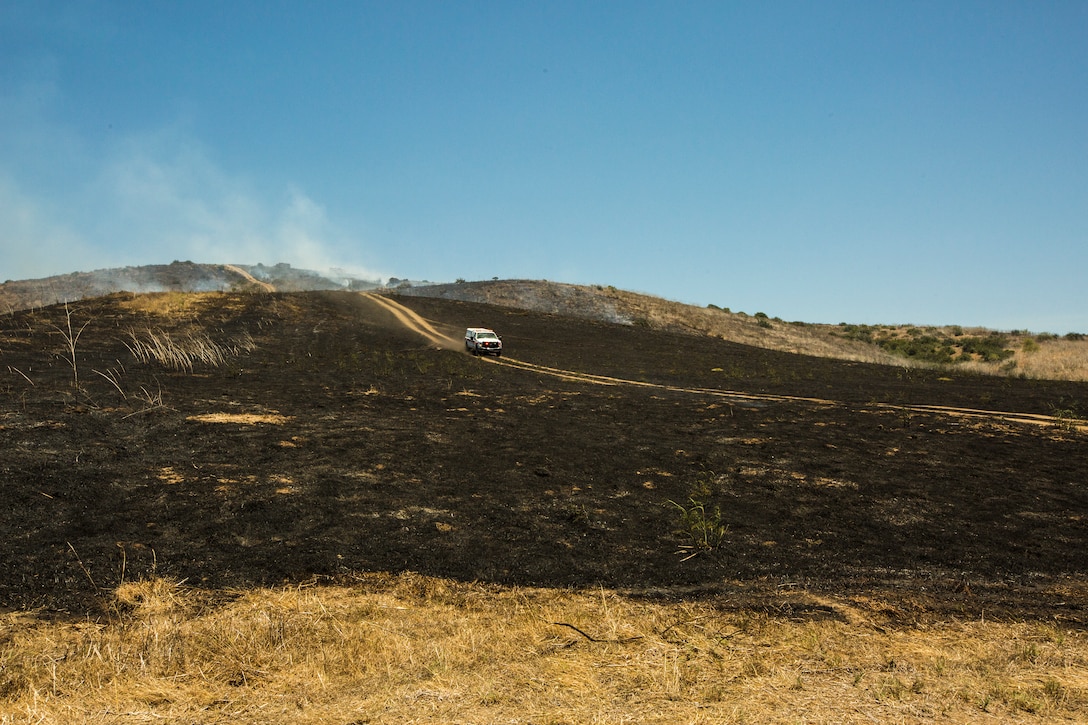 Camp Pendleton firefighters responded to a brush fire that started around 11:30 a.m. in the Mike training area on Marine Corps Base Camp Pendleton, Calif, June 11, 2018. The brush fire, named Puebitos Fire, burned to total of 42 acres lasted for about two and a half hours.
