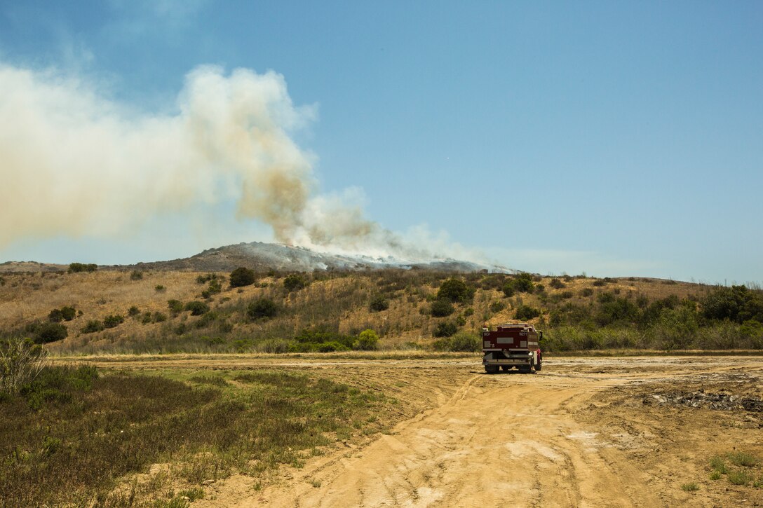 Camp Pendleton firefighters responded to a brush fire that started around 11:30 a.m. in the Mike training area on Marine Corps Base Camp Pendleton, Calif, June 11, 2018. The brush fire, named Puebitos Fire, burned to total of 42 acres lasted for about two and a half hours.