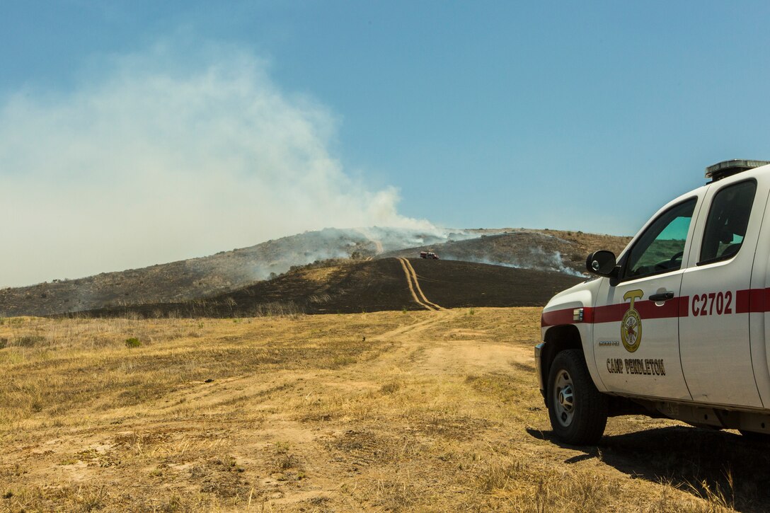 Camp Pendleton firefighters responded to a brush fire that started around 11:30 a.m. in the Mike training area on Marine Corps Base Camp Pendleton, Calif, June 11, 2018. The brush fire, named Puebitos Fire, burned to total of 42 acres lasted for about two and a half hours.