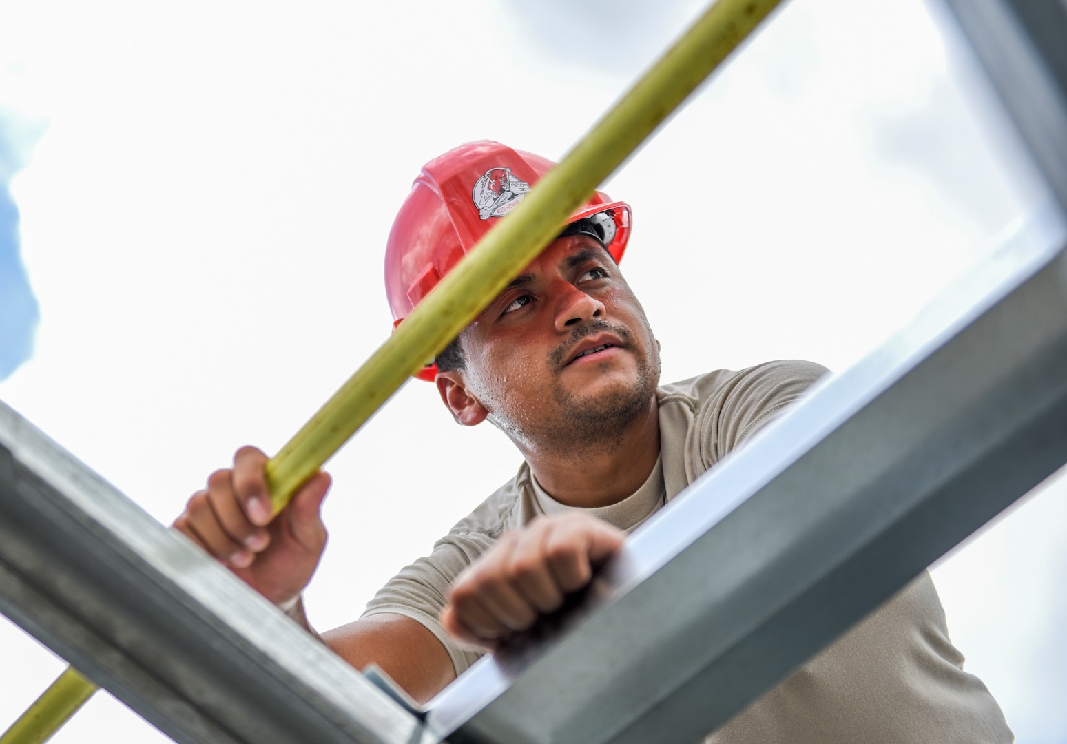 An Air Force engineer assembles a roof