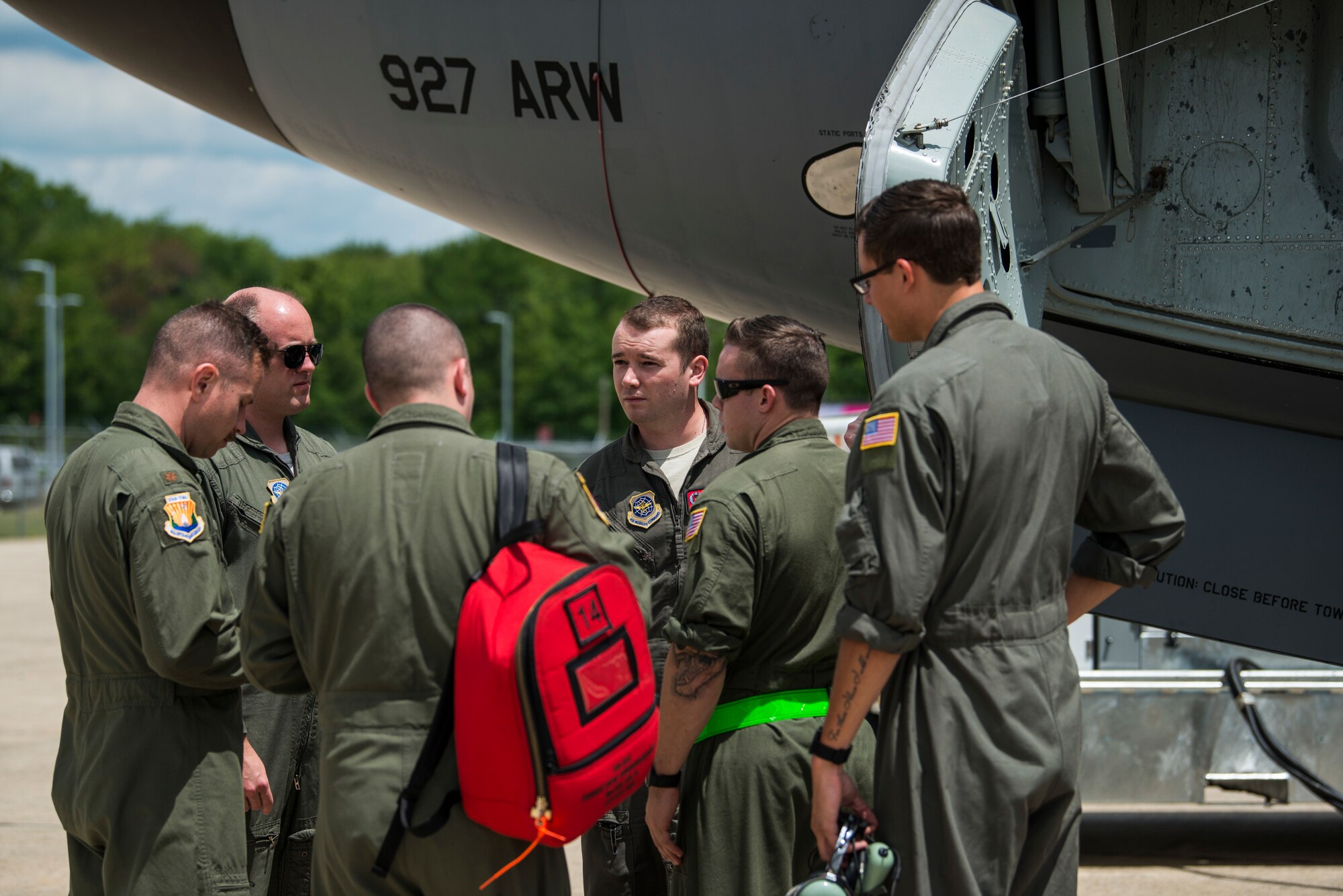 U.S. Air Force Airmen assigned to the 6th Air Mobility Wing, MacDill Air Force Base, Fla., conduct a pre-flight briefing prior to a refueling mission in support of Exercise Swift Response 18, June 8, 2018 at Pease Air National Guard Base, N.H.