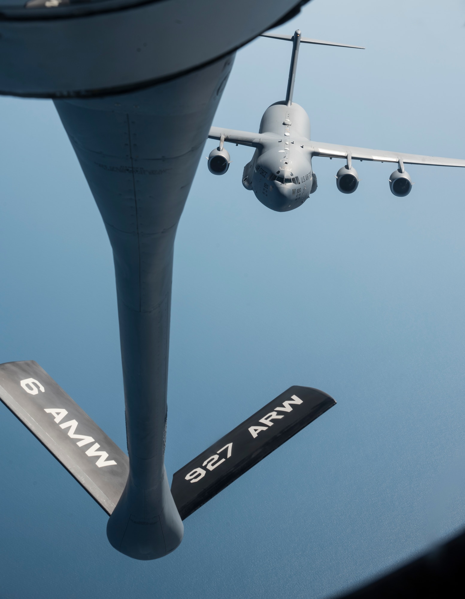 A C-17 Globemaster III aircraft assigned to the 62nd Airlift Wing from Joint Base Lewis-McChord, Wash., approaches a KC-135 Stratotanker aircraft assigned to the 6th Air Mobility Wing, MacDill Air Force Base, Fla., over the Atlantic Ocean during Exercise Swift Response 18 (SR18), June 8, 2018.