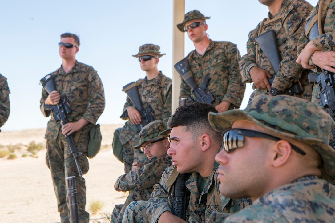 Marines with Combat Logistics Battalion 25, Combat Logistics Regiment 45, 4th Marine Logistics Group, gather for a class on motorized operations at Marine Corps Air Ground Combat Center Twentynine Palms, California, June 9, 2018. During Integrated Training Exercise 4-18, CLB-25 Marines took part in MOT to further their experience with crew-served weapons employment, improvised explosive device immediate action drills and establishment of a Helicopter Landing Zone.